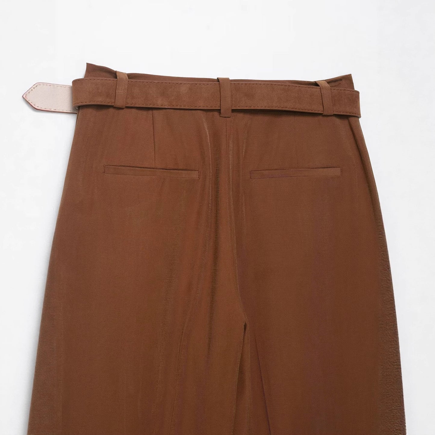 Narrow leg pants with waist belt and hanging pleats by eprolo