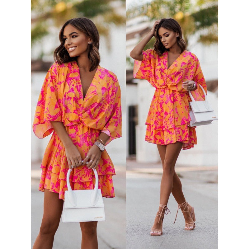 Printed V Neck Twisted Waist Dress by DERILUJA LLC