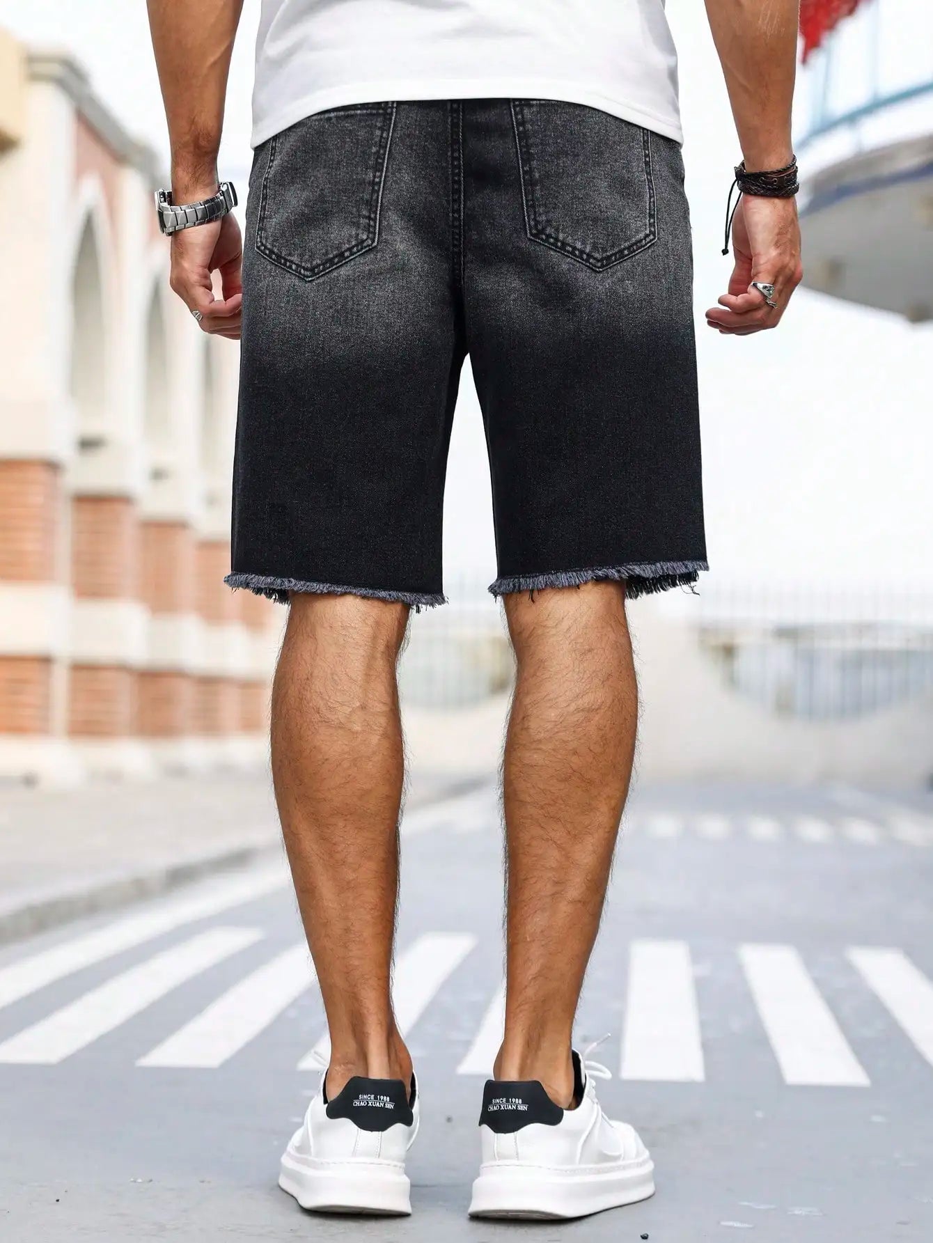 Men's summer denim printed shorts. Black - grey gradient color. Ripped details. Street - style trend. by DERILUJA LLC