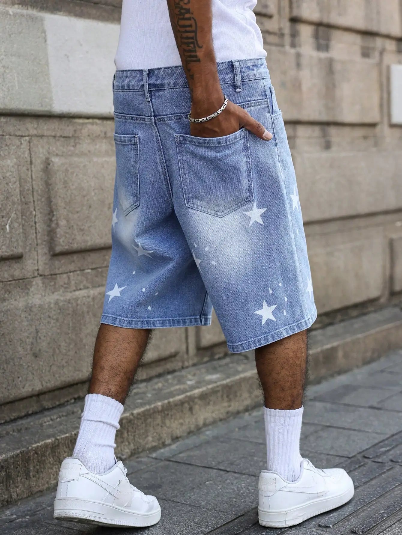 Men's blue denim shorts for spring and summer, with stars printed on the legs, are stylish and simple to match. by DERILUJA LLC