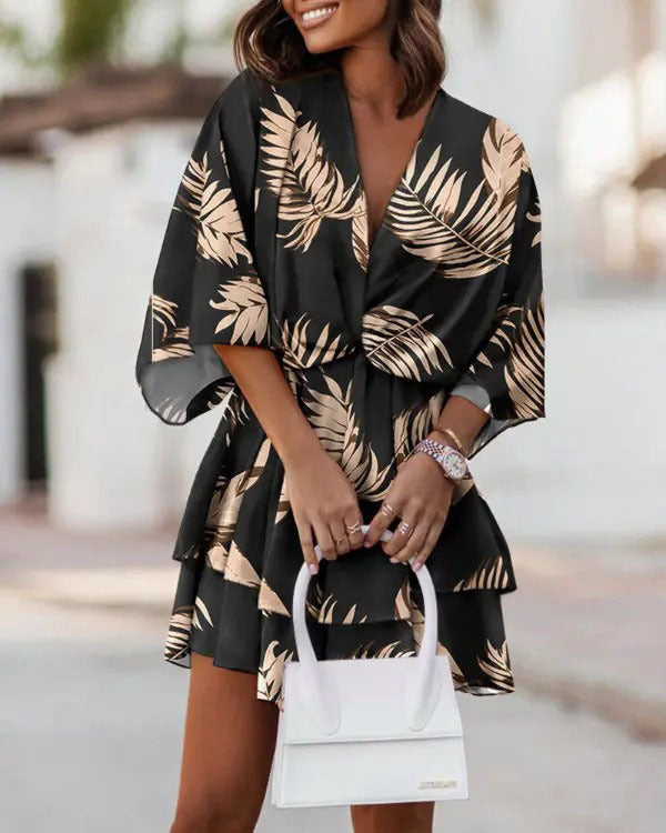 Printed V Neck Twisted Waist Dress by DERILUJA LLC