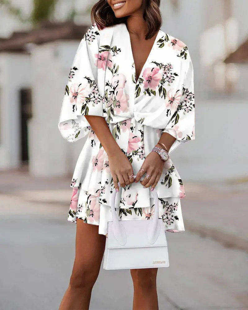 Printed V Neck Twisted Waist Dress by DERILUJA LLC